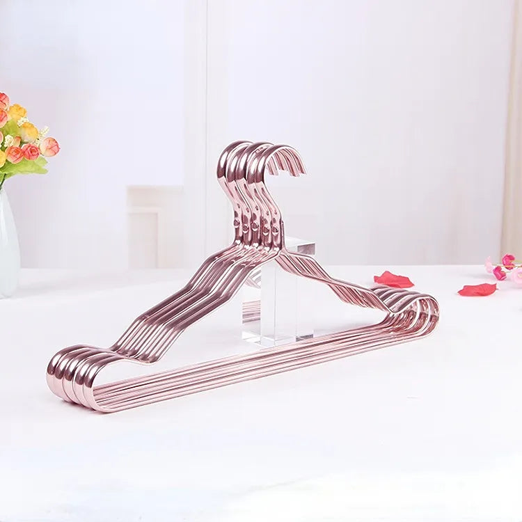 Gold Clothes Hangers with Polished Metal Design