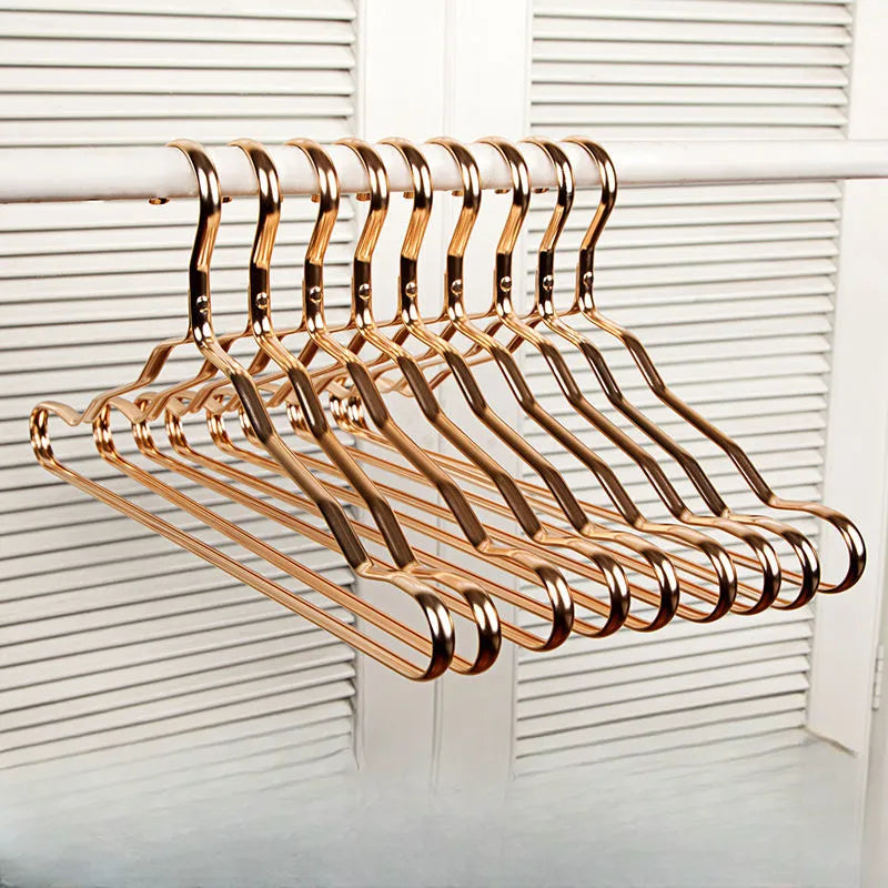 Gold Clothes Hangers with Polished Metal Design