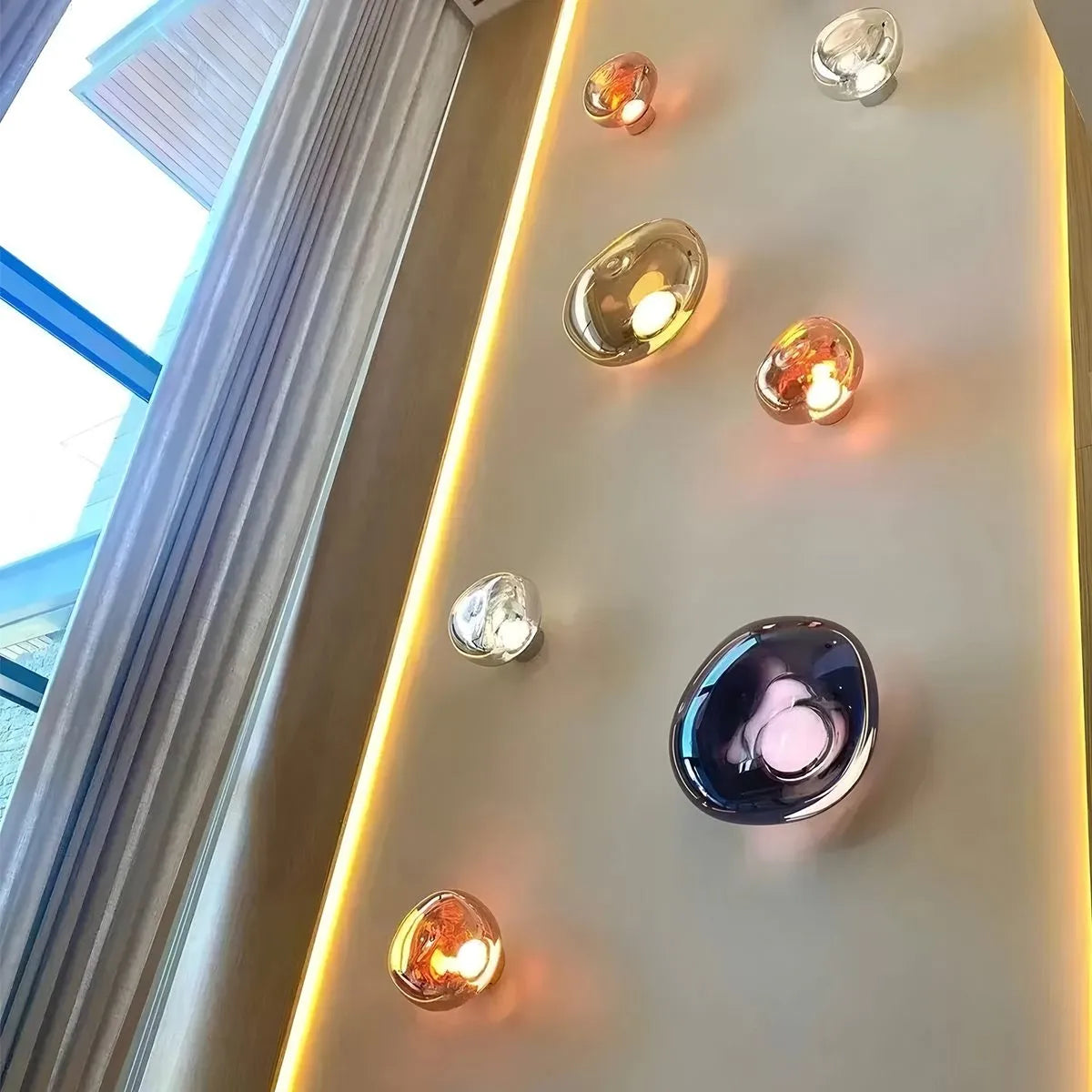 Gold Lava Wall Light with Sculptural Glow Design