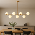 Gold Linear Pendant Light with Globe Shades