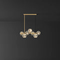Linear Crystal Globe Pendant Light with Modern Brass Design