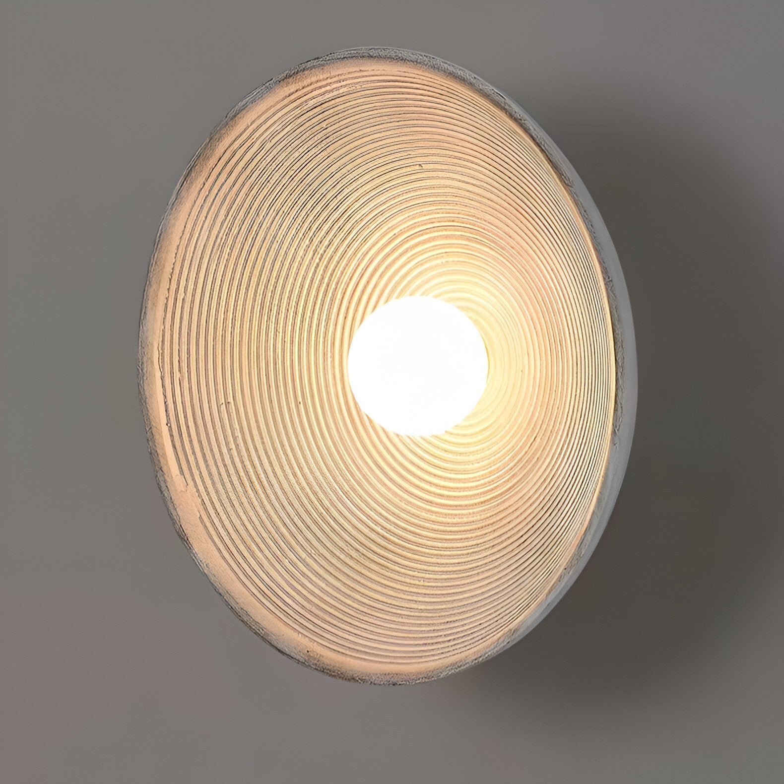 Vintage Concentric Disc Wall Sconce with Retro Sculptural Design